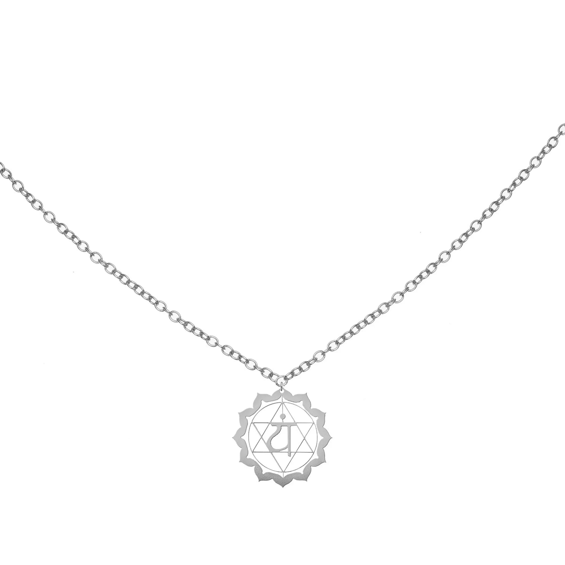 Heart Chakra Coin Necklace featuring sacred symbol pendant on silver chain, displayed on white background