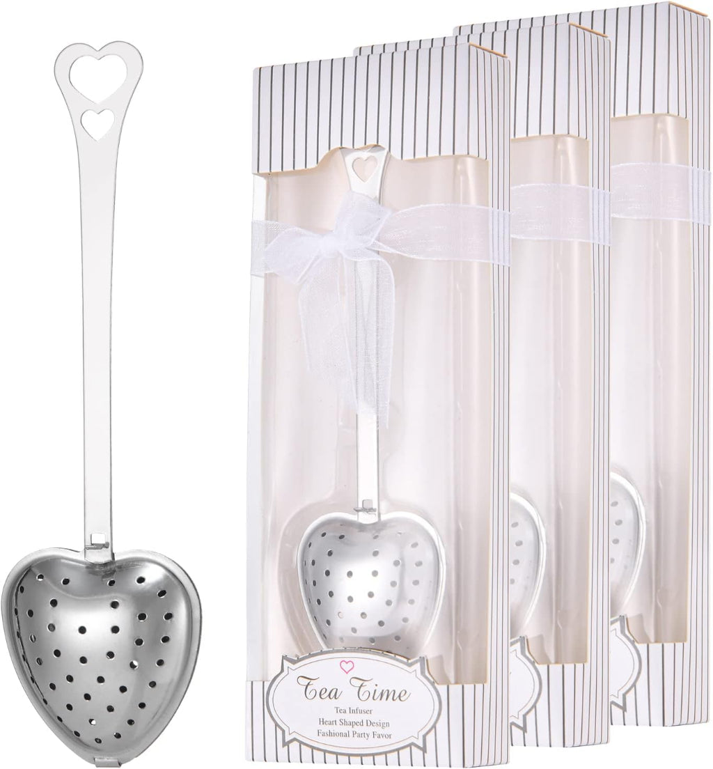 Heart Shaped Tea Infuser – authentic supplier image showing the silver heart-shaped metal tea infuser beside the white striped gift box packaging with ribbon detail and Tea Time label. — for Carpe Diem Dream