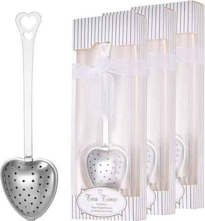 Heart Shaped Tea Infuser – authentic supplier image showing the silver heart-shaped metal tea infuser beside the white striped gift box packaging with ribbon detail and Tea Time label. — for Carpe Diem Dream