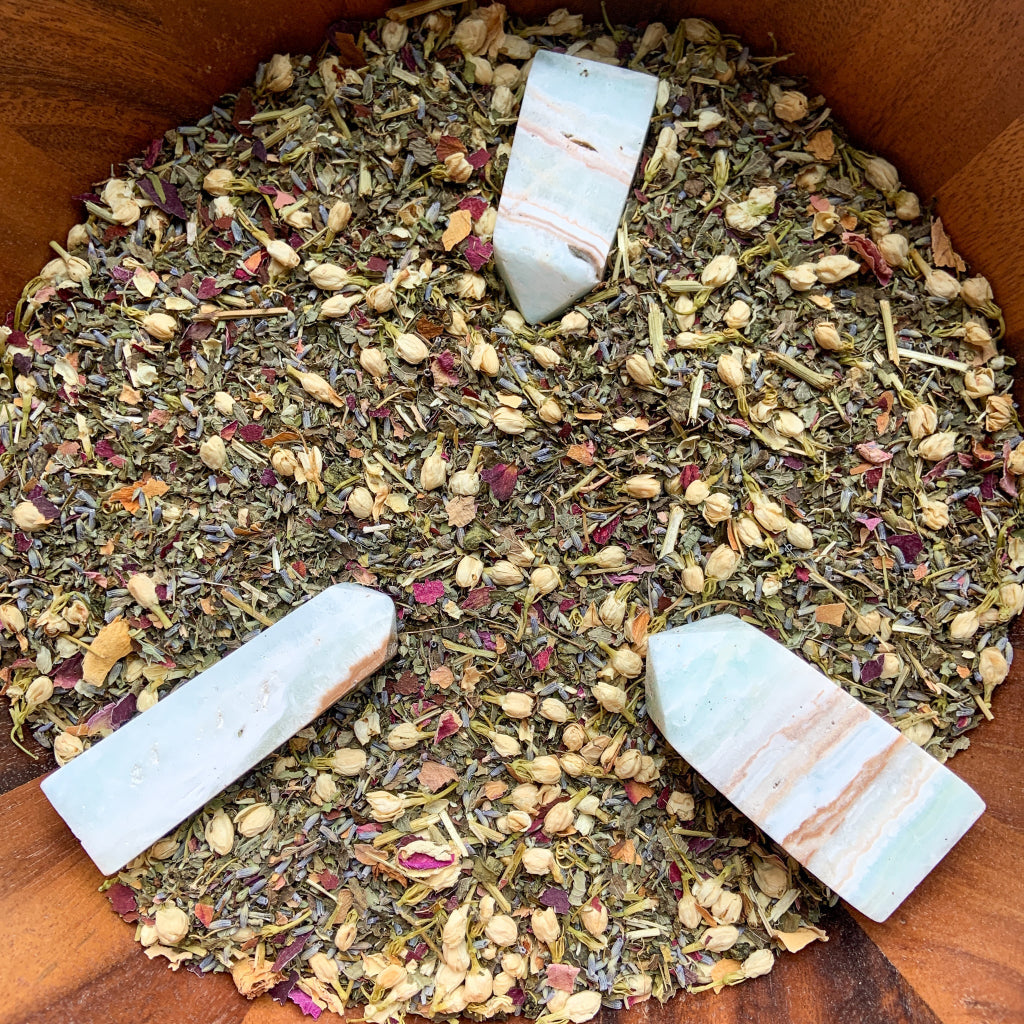 Inner Peace Tea – Authentic supplier image featuring the finished organic loose-leaf herbal blend infused with Carribean Calcite crystal energy, shown exactly as prepared by the supplier before packaging. — for Carpe Diem Dream