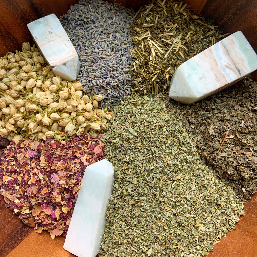 Inner Peace Tea – Authentic supplier image showing the organic herbal ingredients and Carribean Calcite crystals used to create the crystal-infused loose-leaf blend, exactly as provided by the supplier. — for Carpe Diem Dream