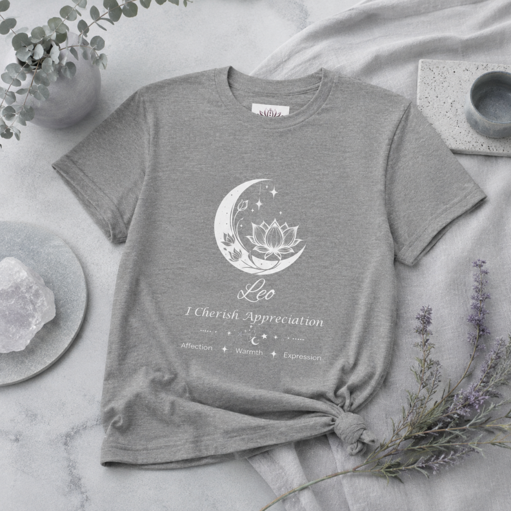 Leo Moon I Cherish Appreciation zodiac T-shirt in Athletic Heather with white moon-inspired lotus, floral, and celestial artwork and Affection, Warmth, Expression text, styled in a cool-toned studio botanical flat lay. — for Carpe Diem Dream