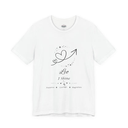 White Leo Rising I Shine zodiac T-shirt with black celestial heart and arrow artwork, shown in a flat supplier mockup. — for Carpe Diem Dream
