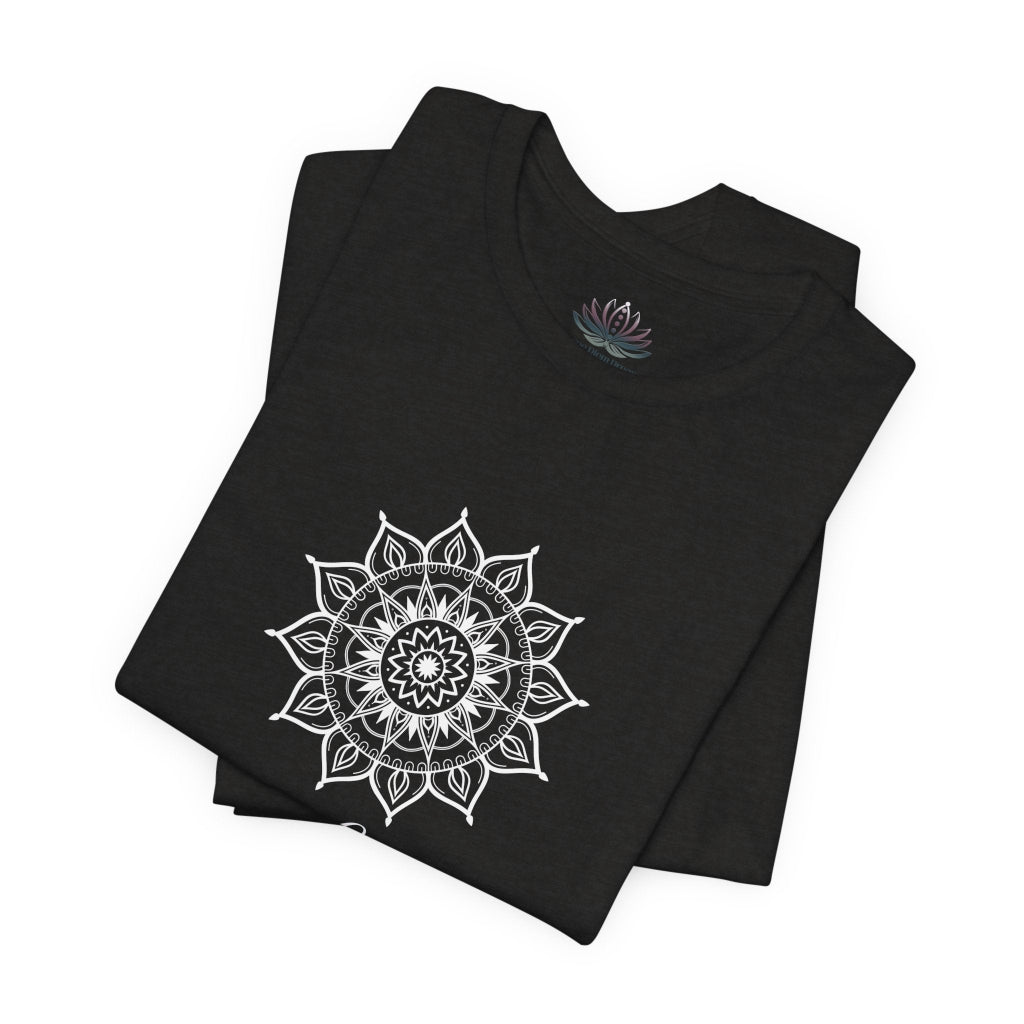 Leo Sun I Will zodiac t-shirt in black heather with white sun-inspired mandala artwork and Confidence, Creativity, Generosity text, shown folded in a supplier mockup. — for Carpe Diem Dream