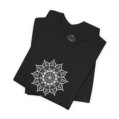 Leo Sun I Will zodiac t-shirt in black heather with white sun-inspired mandala artwork and Confidence, Creativity, Generosity text, shown folded in a supplier mockup. — for Carpe Diem Dream