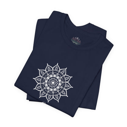 Leo Sun I Will zodiac t-shirt in navy with white sun-inspired mandala artwork and Confidence, Creativity, Generosity text, shown folded in a supplier mockup. — for Carpe Diem Dream