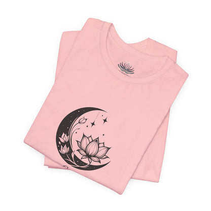 Libra Moon I Cherish Harmony zodiac T-shirt in pink with black moon-inspired lotus, floral, and celestial artwork, shown folded in a supplier mockup. — for Carpe Diem Dream