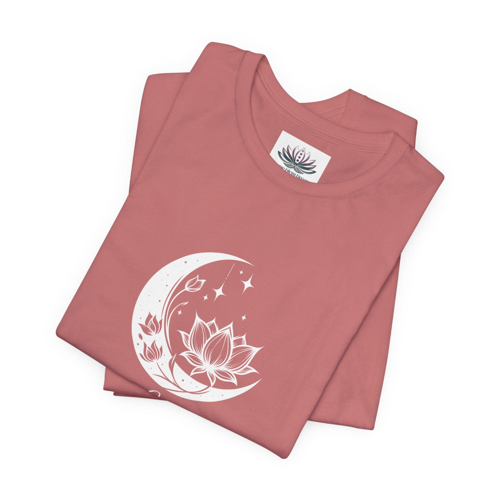 Libra Moon I Cherish Harmony zodiac T-shirt in mauve with white moon-inspired lotus, floral, and celestial artwork, shown folded in a supplier mockup. — for Carpe Diem Dream