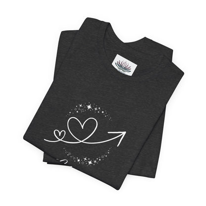 Libra Rising I Connect zodiac T-shirt in Dark Grey Heather with white celestial heart and arrow artwork, shown folded in a supplier mockup. — for Carpe Diem Dream