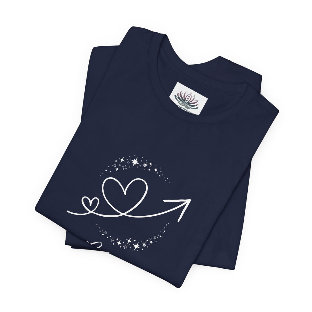 Libra Rising I Connect zodiac T-shirt in navy with white celestial heart and arrow artwork, shown folded in a supplier mockup. — for Carpe Diem Dream