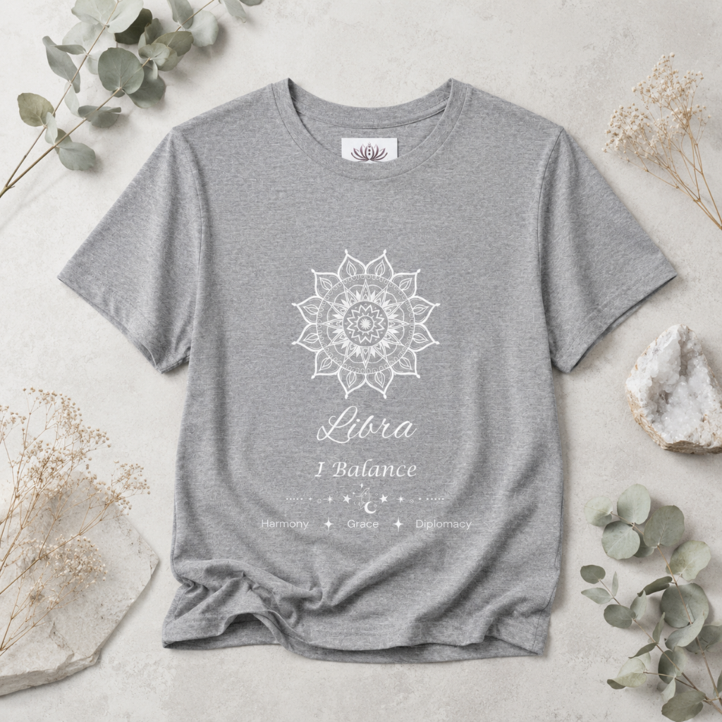 Libra Sun I Balance zodiac T-shirt in athletic heather with white sun-inspired mandala artwork and Harmony, Grace, Diplomacy text, styled in a cool-toned studio botanical flat lay. — for Carpe Diem Dream