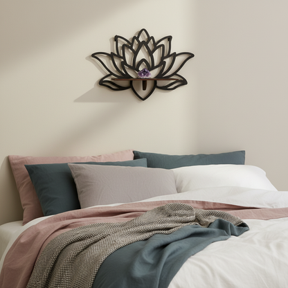 A lotus-shaped floating wall shelf mounted above a bed on a neutral wall holding a crystal in a softly styled bedroom setting. — for Carpe Diem Dream