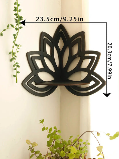 A black lotus-shaped wall shelf mounted in a corner with visible dimensions labeled approximately 23.5 cm wide and 20.3 cm tall with greenery in the scene. — for Carpe Diem Dream
