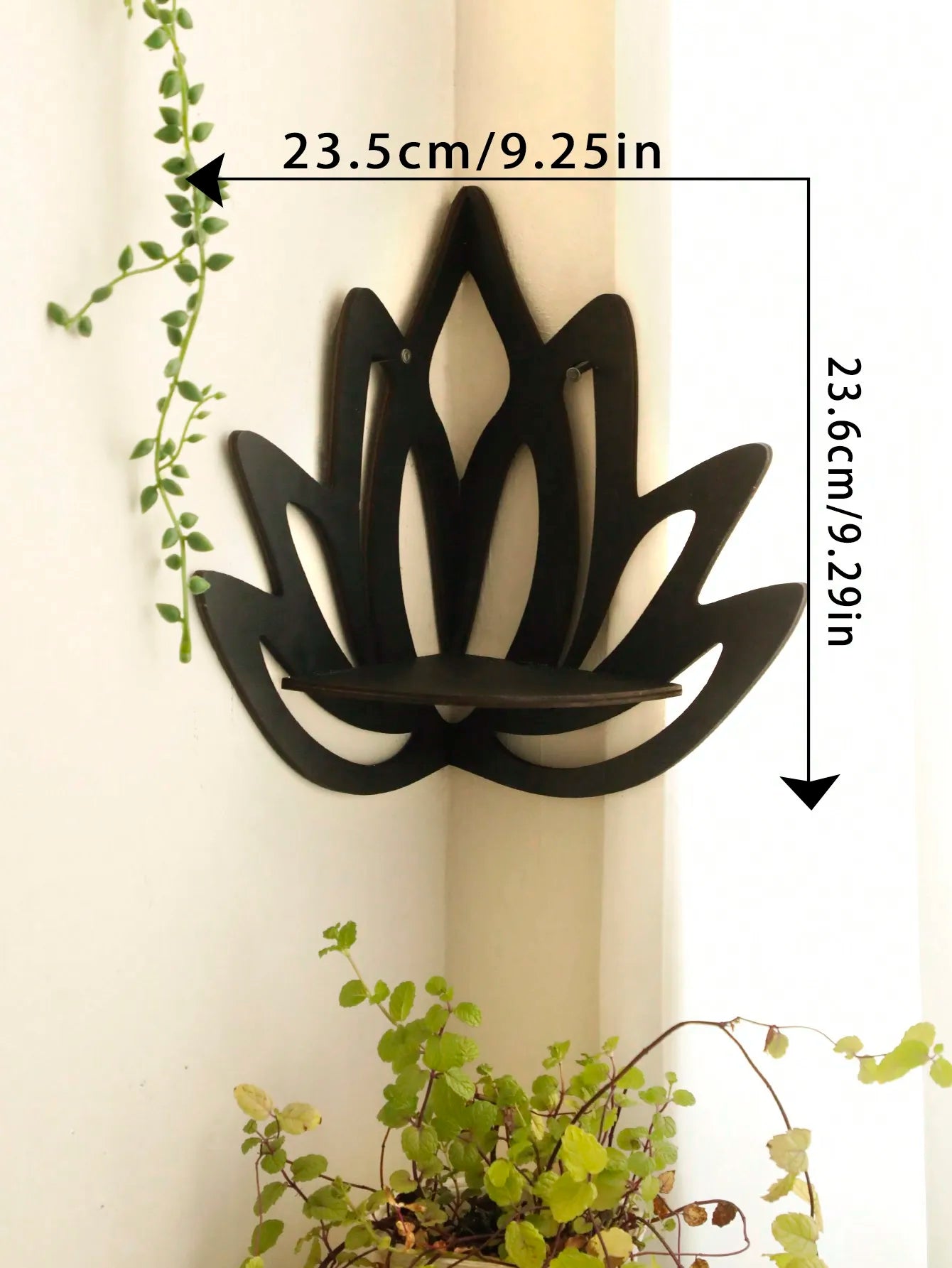 A black lotus-shaped wall shelf mounted in a corner with visible dimensions labeled approximately 23.5 cm wide and 23.6 cm tall. — for Carpe Diem Dream
