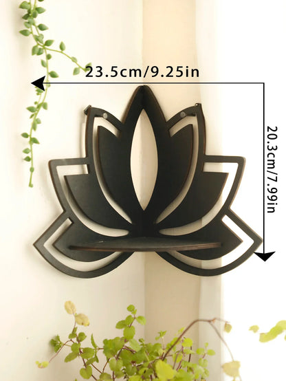 A black lotus-shaped wall shelf mounted on a wall with visible dimensions labeled approximately 23.5 cm wide and 20.3 cm tall with greenery surrounding the scene. — for Carpe Diem Dream