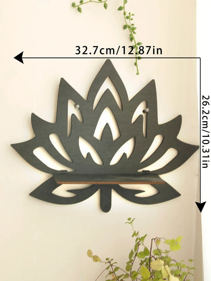 A black lotus-shaped wall shelf mounted on a wall with visible dimensions labeled approximately 32.7 cm wide and 26.2 cm tall with greenery in the scene. — for Carpe Diem Dream