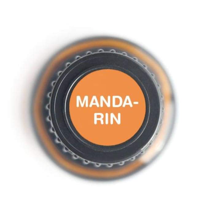 Top view of amber glass bottle cap labeled Mandarin with orange center on white background. — for Carpe Diem Dream