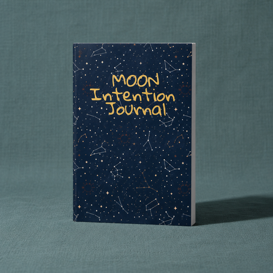 Moon Intention Journal displayed upright featuring celestial artwork and constellation details for intention setting, moon rituals, and manifestation journaling. — for Carpe Diem Dream.