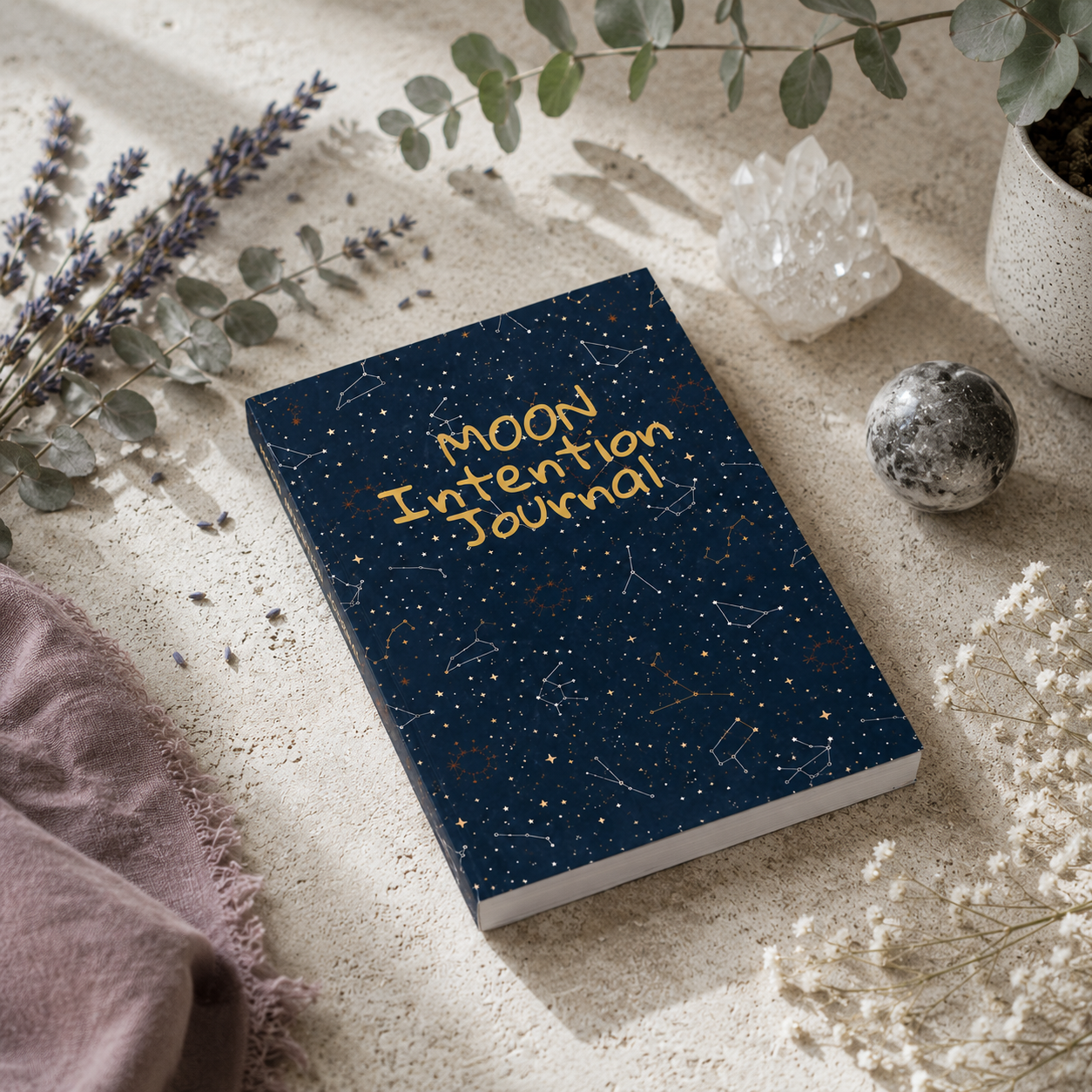 Moon Intention Journal styled with lavender, eucalyptus, crystals, and botanical accents in a serene studio setting for intention setting and moon ritual practices. — for Carpe Diem Dream