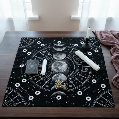 Moon phase altar cloth displayed on a wooden table with tarot deck, selenite wands, and candle in a serene ritual setting. — for Carpe Diem Dream