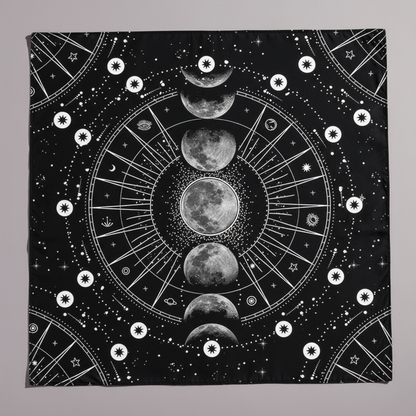 Moon phase altar cloth featuring a detailed lunar cycle design on a black fabric background with celestial symbols. — for Carpe Diem Dream