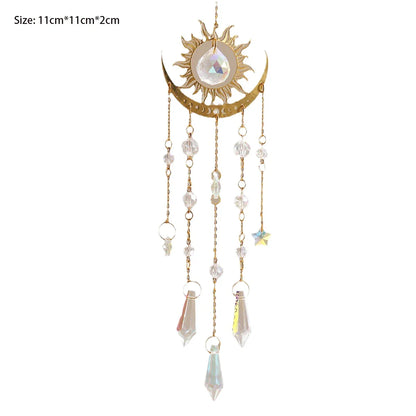 Moon Sun variant of a gold moon phase crystal sun catcher featuring a sun and crescent moon design with hanging faceted crystals on a white background. — for Carpe Diem Dream