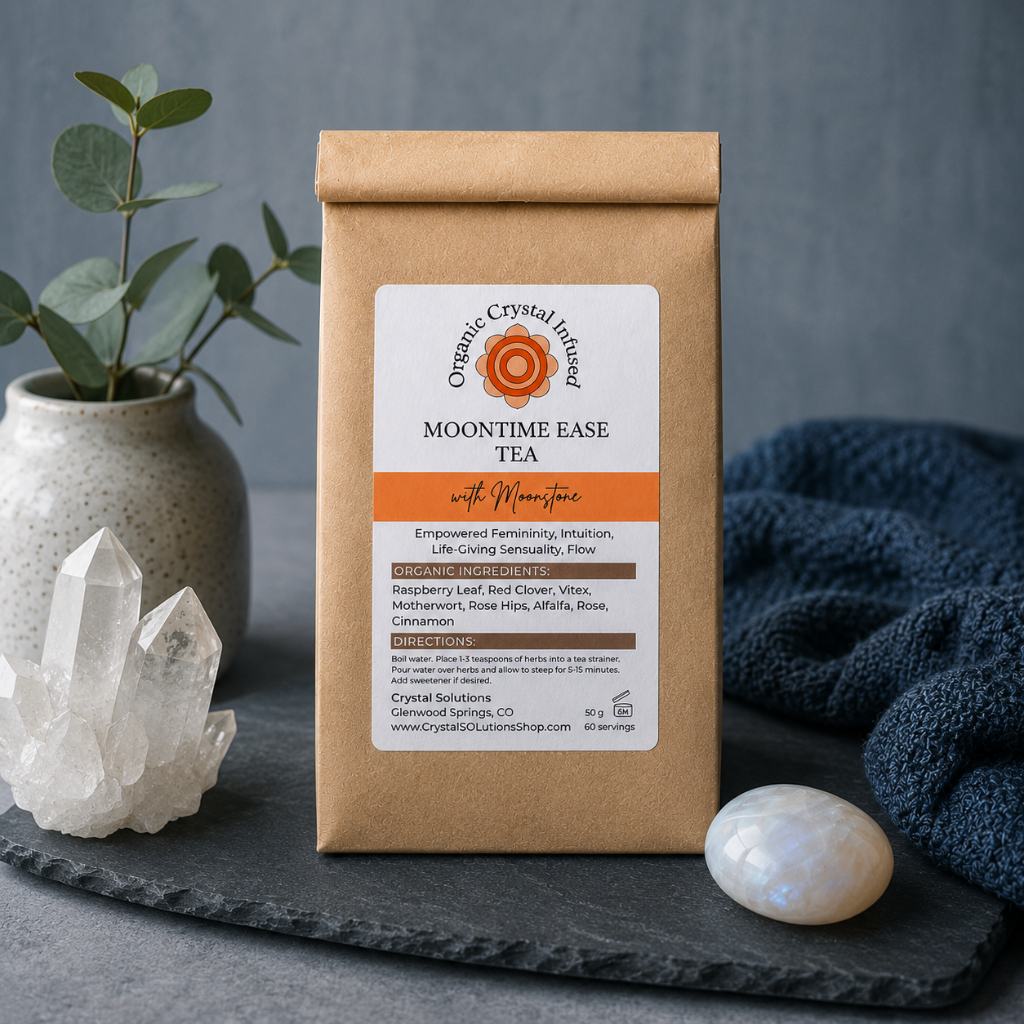 Moon Time Ease Tea – Organic Crystal-Infused Tea with Moonstone displayed in the Carpe Diem Dream signature editorial studio with Roman Clay architecture, cool greige tones, premium styling, and a freshly brewed cup of herbal tea. — for Carpe Diem Dream