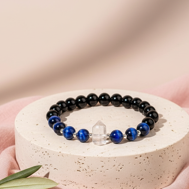 Negativity Filter gemstone bracelet displayed upright on soft blush background with natural shadow. — for Carpe Diem Dream