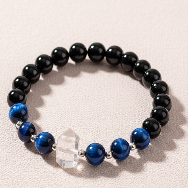Negativity Filter gemstone bracelet displayed upright on soft blush background with natural shadow. — for Carpe Diem Dream