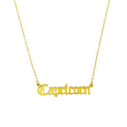 Gold Old English Zodiac Capricorn Necklace with astrology lettering on white background for Carpe Diem Dream