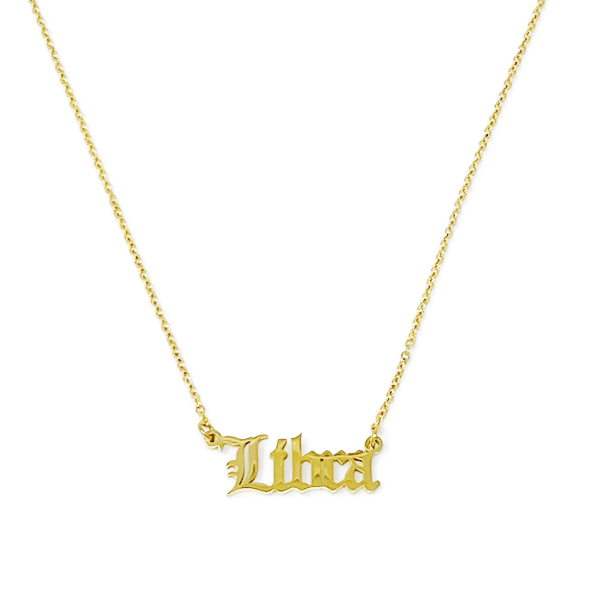 Gold Old English Zodiac Libra Necklace with astrology lettering on white background for Carpe Diem Dream