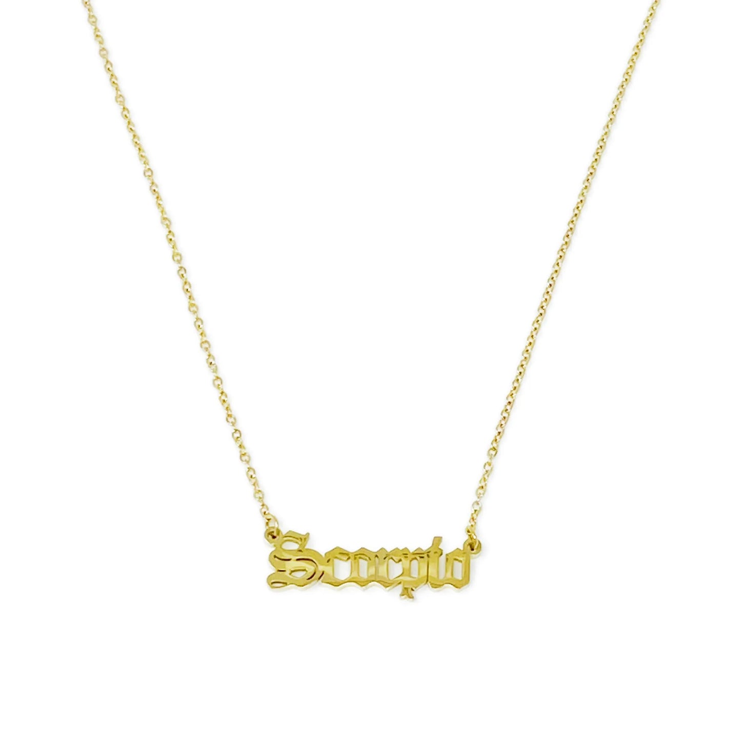Gold Old English Zodiac Scorpio Necklace with astrology lettering on white background for Carpe Diem Dream