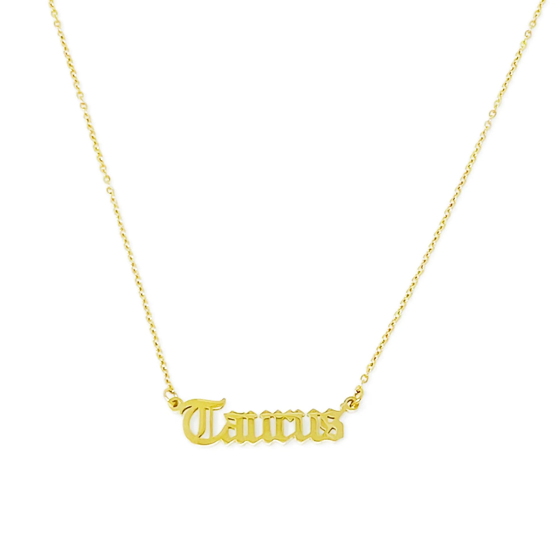 Gold Old English Zodiac Taurus Necklace with astrology lettering on white background for Carpe Diem Dream
