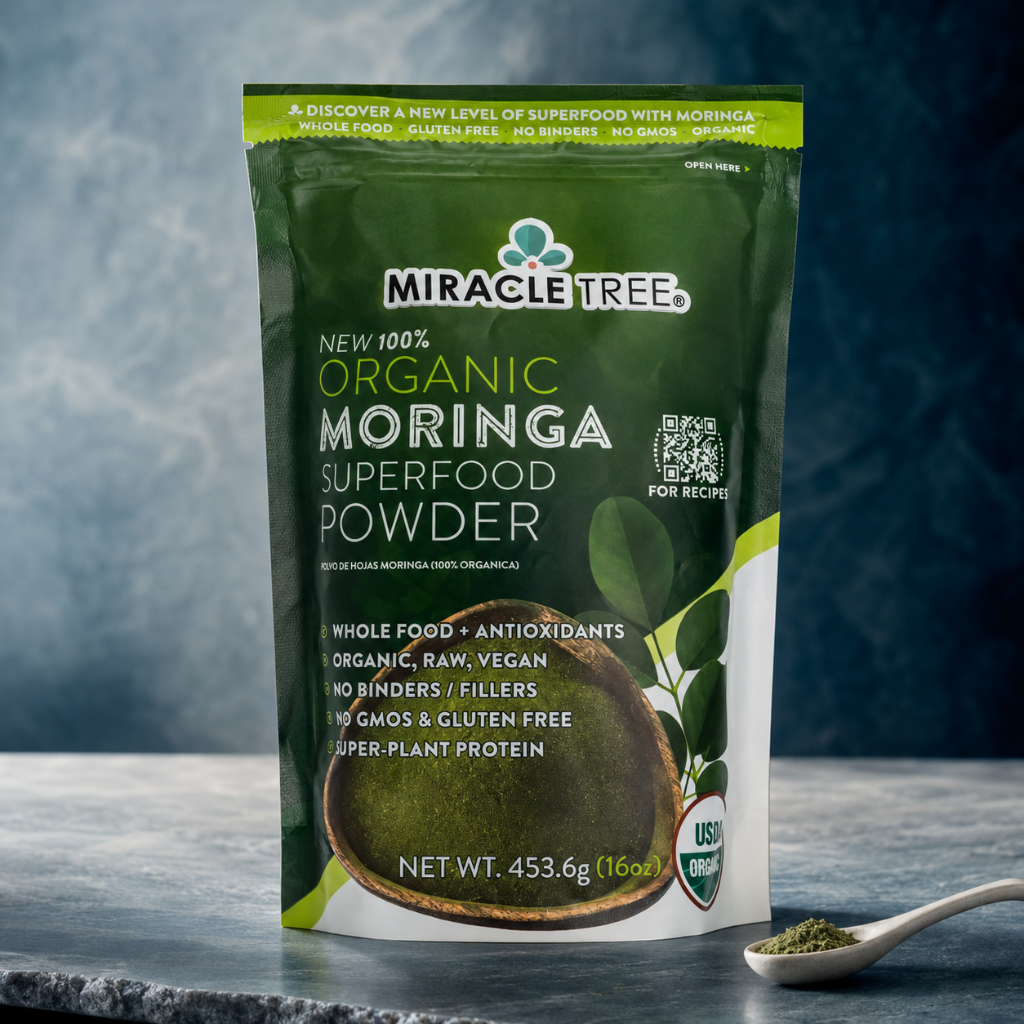 Organic Moringa Superfood Powder 16oz pouch photographed on a cool blue-gray stone surface with moringa powder and crisp label detail. — for Carpe Diem Dream