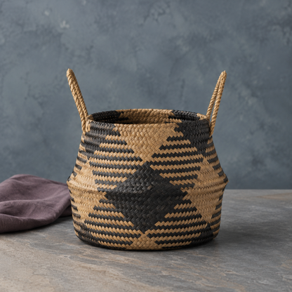Black plaid woven storage basket professionally photographed on a cool blue-gray stone surface with mauve linen accent. — for Carpe Diem Dream