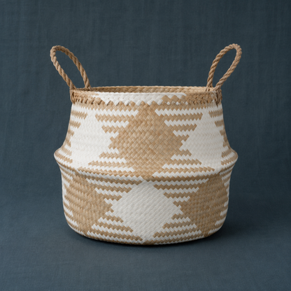 Single black and white plaid woven storage basket on a dark teal textured linen backdrop. — for Carpe Diem Dream