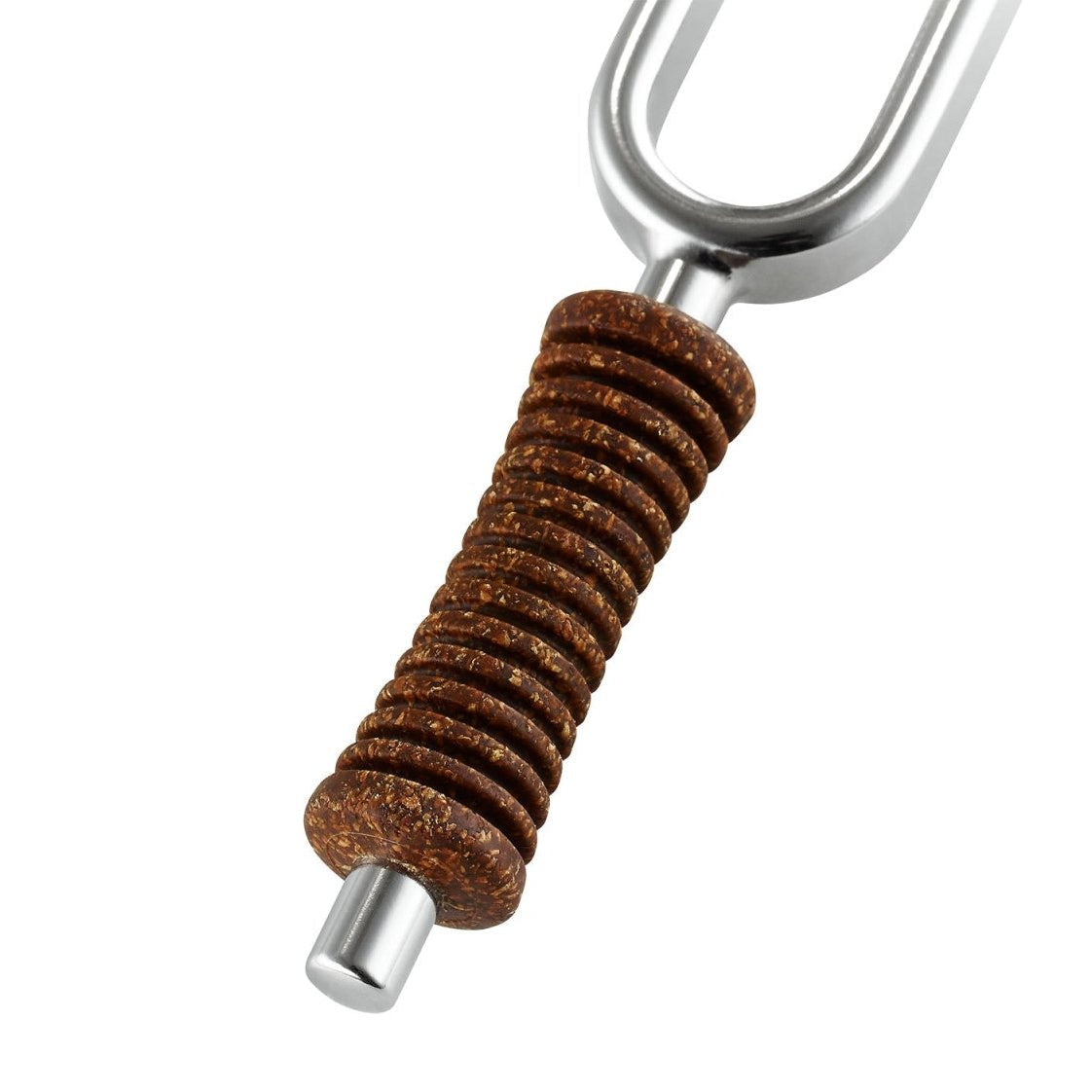 Close-up of a planetary tuned metal tuning fork showing the ergonomically shaped cork handle and polished nickel-plated steel prongs on a white background. — for Carpe Diem Dream