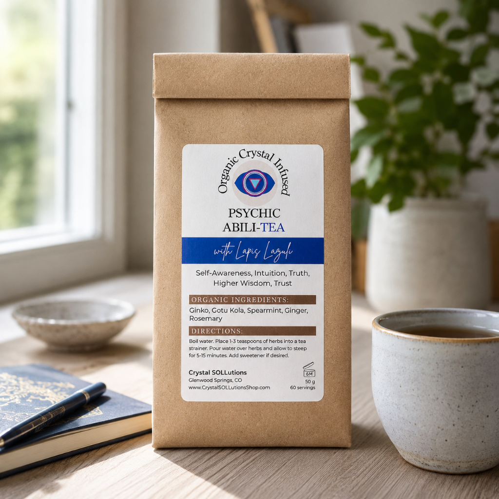 Psychic Abili-Tea – Organic Crystal Infused displayed in a peaceful lifestyle setting with a journal, tea cup, and natural daylight, creating an atmosphere of intuition, reflection, mindfulness, and spiritual wellness. — for Carpe Diem Dream