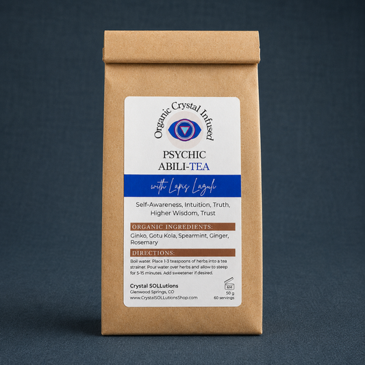 Psychic Abili-Tea – Organic Crystal Infused 50g loose-leaf herbal tea with Lapis Lazuli crystal energy displayed as a standalone kraft paper package on a #374F59 textured linen background with cool-toned diffused lighting and soft studio shadows. — for Carpe Diem Dream