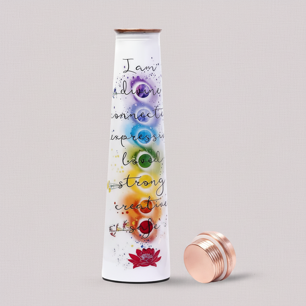 Light grey mauve background copper water bottle with printed “I Am” affirmations and 7 chakra symbols, standing with its matching copper lid beside it. — for Carpe Diem Dream