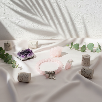 Rose Quartz Healing Crystal Set displayed on blush silk with travertine stone, amethyst, rose quartz, and eucalyptus in soft natural light – for Carpe Diem Dream.