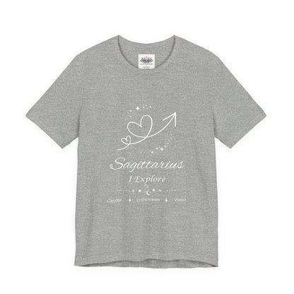 Athletic Heather Sagittarius Rising I Explore zodiac T-shirt with white celestial heart and arrow artwork, shown in a flat supplier mockup. — for Carpe Diem Dream