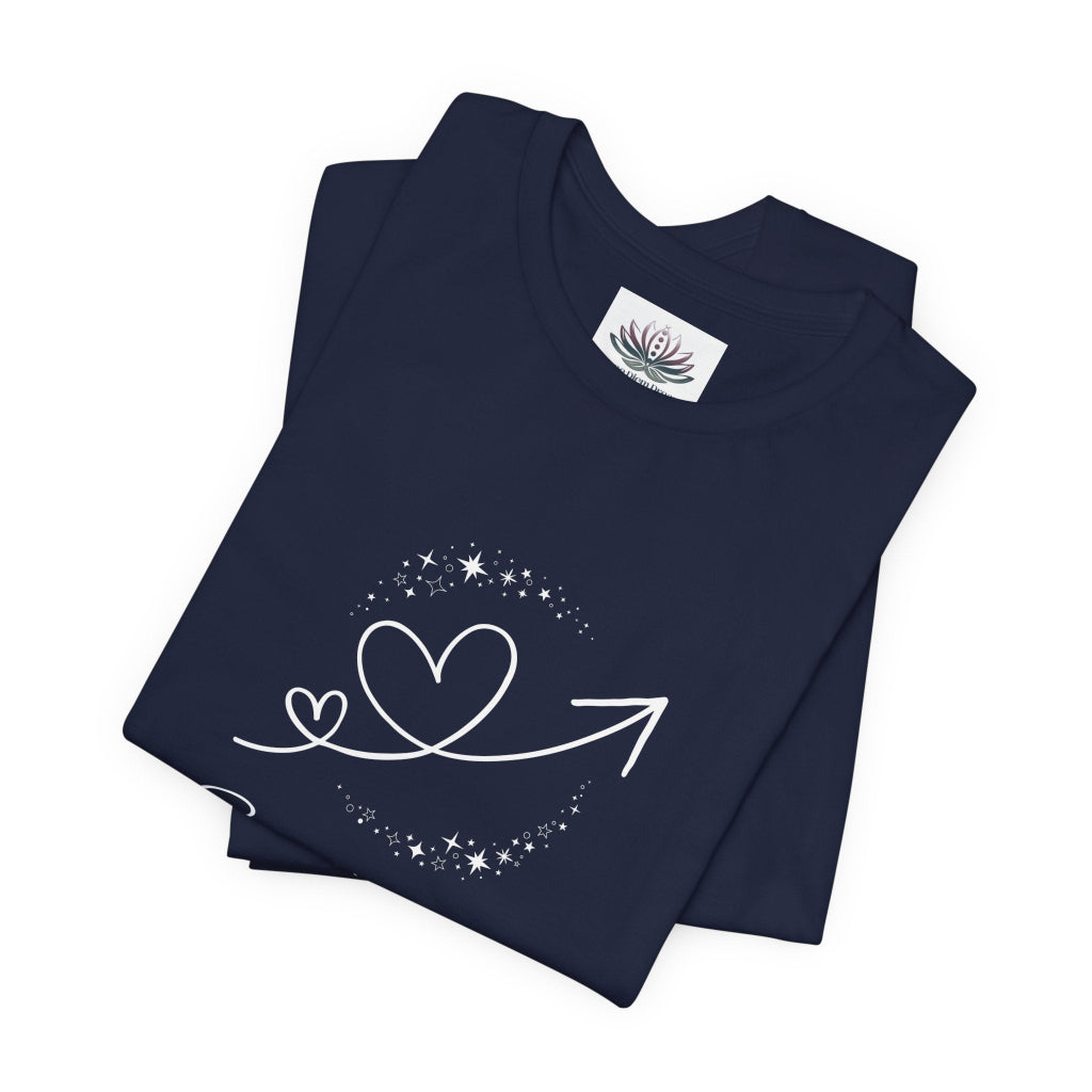 Sagittarius Rising I Explore zodiac T-shirt in navy with white celestial heart and arrow artwork, shown folded in a supplier mockup. — for Carpe Diem Dream