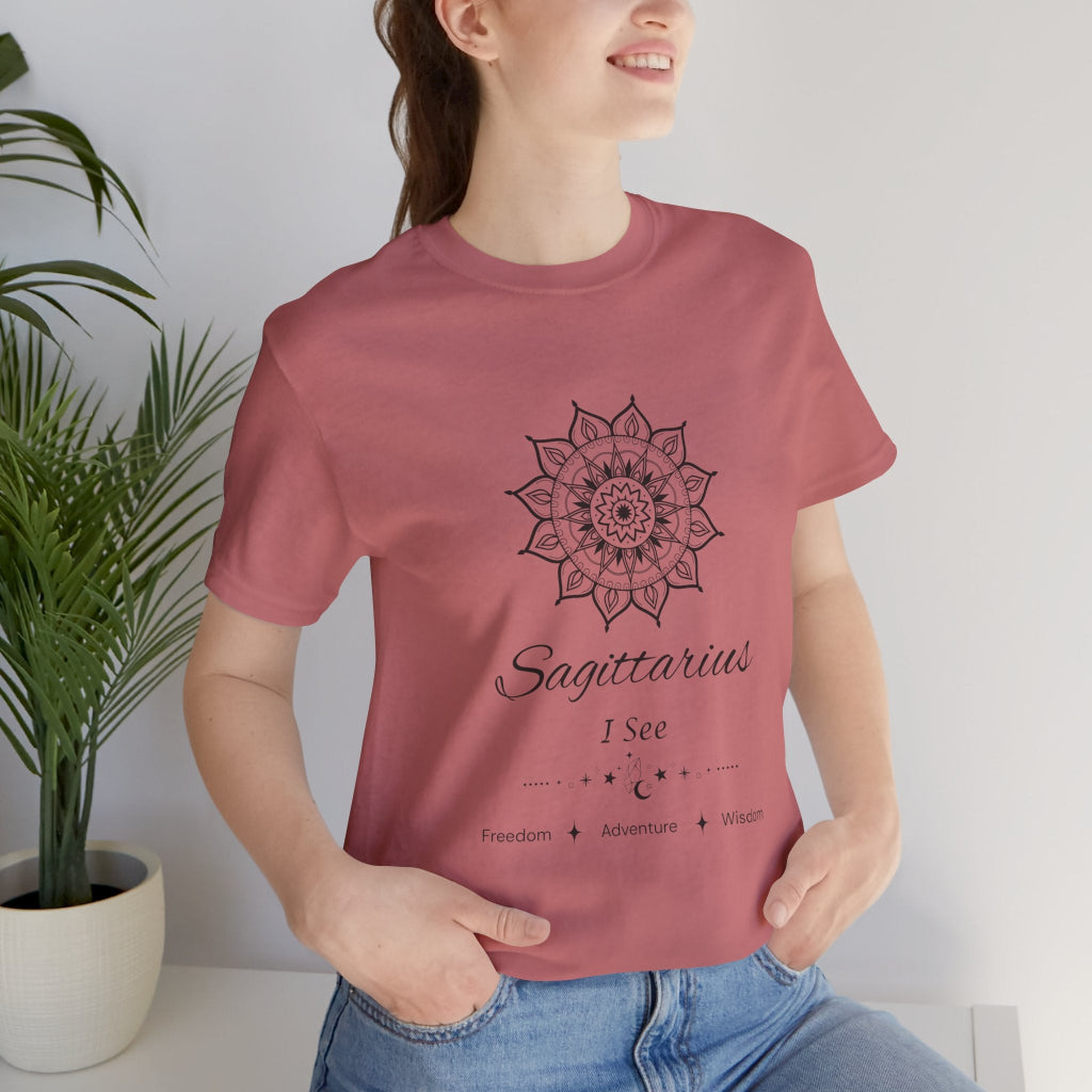 Sagittarius Sun I See zodiac T-shirt in mauve with black sun-inspired mandala artwork, shown worn by a model in a supplier mockup. — for Carpe Diem Dream