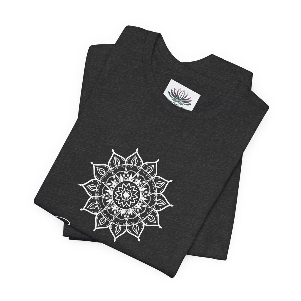 Sagittarius Sun I See zodiac T-shirt in dark gray heather with white sun-inspired mandala artwork, shown folded with Carpe Diem Dream neck label in a supplier mockup. — for Carpe Diem Dream