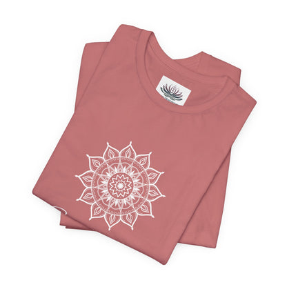 Sagittarius Sun I See zodiac T-shirt in mauve with white sun-inspired mandala artwork, shown folded with Carpe Diem Dream neck label in a supplier mockup. — for Carpe Diem Dream