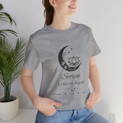 Model wearing an Athletic Heather Scorpio Moon I Cherish Depth zodiac T-shirt with black moon-inspired lotus, floral, and celestial artwork. — for Carpe Diem Dream