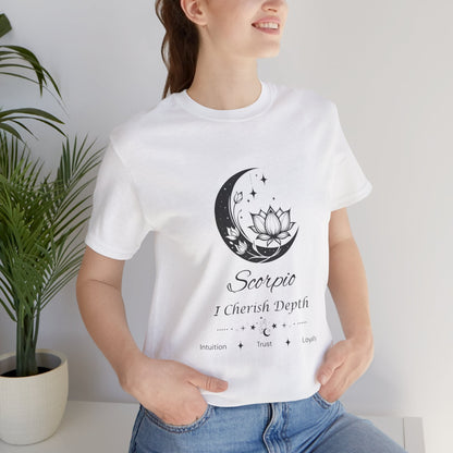 Model wearing a white Scorpio Moon I Cherish Depth zodiac T-shirt with black moon-inspired lotus, floral, and celestial artwork. — for Carpe Diem Dream