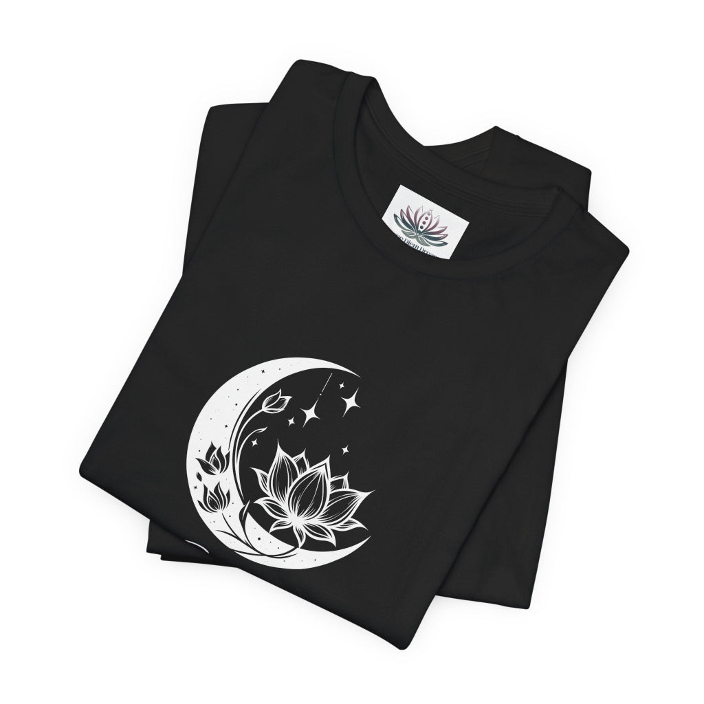 Scorpio Moon I Cherish Depth zodiac T-shirt in black with white moon-inspired lotus, floral, and celestial artwork, shown folded in a supplier mockup. — for Carpe Diem Dream