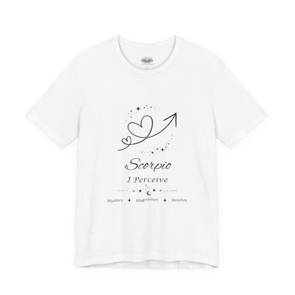 White Scorpio Rising I Perceive zodiac T-shirt with black celestial heart and arrow artwork, shown in a flat supplier mockup. — for Carpe Diem Dream